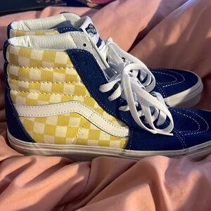 Checkered vans 
Blue and yellow